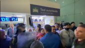 Desatan violencia en AICM; se enfrentan taxistas contra personal del aeropuerto por deuda millonaria