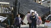 Hombre ve cómo sacan el cuerpo de su esposa de los escombros tras terremoto en Japón; van 84 fallecidos